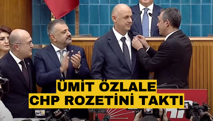 Ümit Özlale'ye CHP rozetini taktı